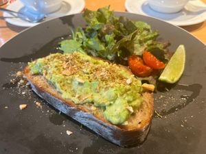 Ask for the toast (campagne bread) and add avocado. Ask for no egg or cheese, and this perfect breakfast will come out. Amazing!  at Common Well  in Kyoto