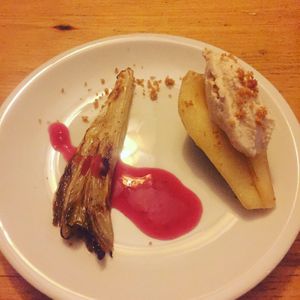several course dinner - cashew cheese on pear and fried chicory  at Kombuse in Mannheim