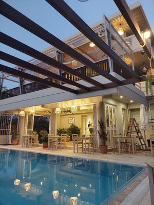 Dining and breakfast area along the pool at GOJI Vegan Hotel in Rhodes