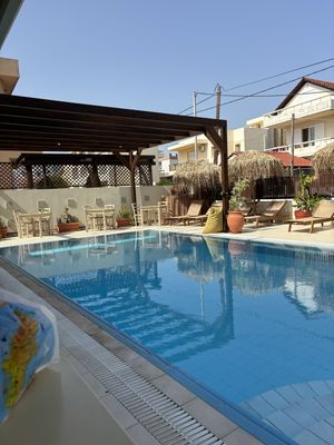  The relaxing pool area which we loved hanging out in!  at GOJI Vegan Hotel in Rhodes