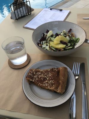 A pie and a lighter kind of salad.  at GOJI Vegan Hotel in Rhodes