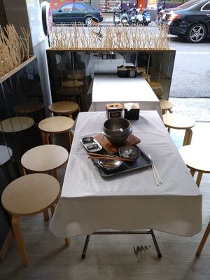 Minimal outdoor arcade seating, no indoor seating at Veggie All In - 歐迎食素 in Kaohsiung