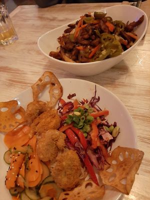 Philly cheese steak poutine and shrimp noodles bowl at MeeT on Blanshard in Victoria