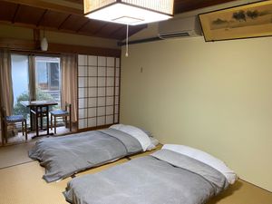 Room with two futons at Yochi-in Temple Pilgrim's Lodging in Koya