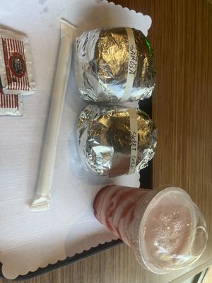 Samosa burger and sweet chili chicken burger with strawberry shake  at Tera V Burger in Vancouver