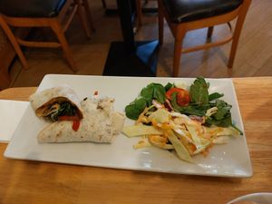Mexican wrap with slaw and side salad at No Meating Place in Rugby