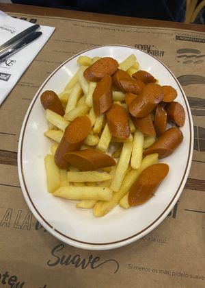 salchipapa  at Dominó in Santiago