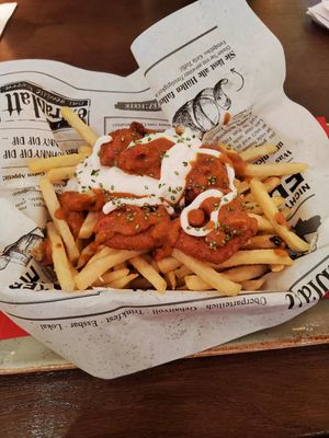 Vegan Chicken Nuggets with Peanuts Sauce and fries at Cafe Extrablatt - Am Marstall in Hannover