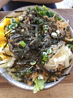 Choose your ingredients bowl with Japanese rice, mixed greens, mango, wakame, crisp onions, nori sheet, shimeji mushrooms, wasabi green peas, soy sauce  at Mana Poke in Itu