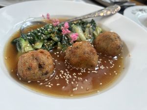 Plant balls and pak choi  at Na Vayla Paplern-Vegan Restaurant in Bangkok