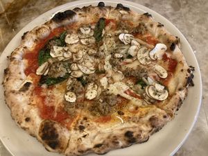 Vegan meat & cheese— delicious but will create garlic breath   at pizza marumo in Tokyo