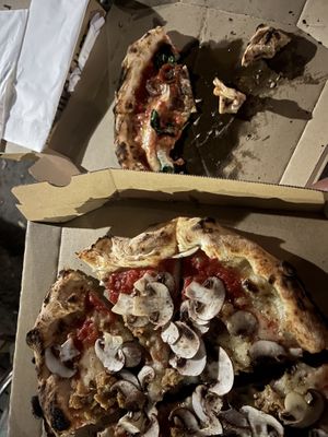 Their vegan pizzas, half margherita/half marinara, and their mushroom/garlic pizza    at pizza marumo in Tokyo