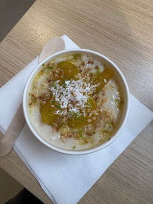 Poached pear, coconut + lime rice pudding  at Salt N Fire in Inverness