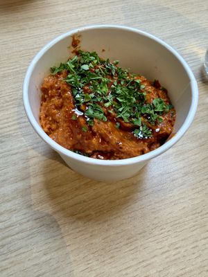 Muhammara comes with Syrian bread  at Salt N Fire in Inverness