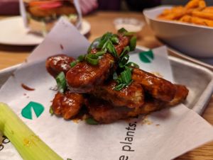 Buffalo wings with BBQ sauce  at Veggie Grill by Next Level in Portland