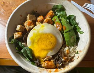 Cali tempeh power bowl, and I added that delicious runny style fake egg.  Loved it!!  at Veggie Grill by Next Level in Portland