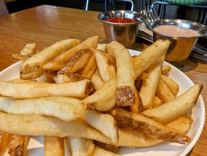 Golden Fries with Dipping Sauce at Veggie Grill by Next Level in Portland