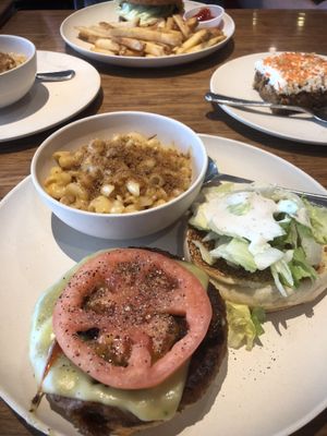 Steakhouse burger with Mac n cheese and a side of their carrot cake.  at Veggie Grill by Next Level in Portland