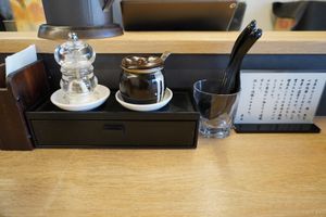 what you see when you're seated. Chopsticks are inside the drawer. at Tsukemen Zuppa - (つけ麺zuppa) in Tokyo