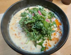 Creamy soy milk ramen with chilli oil and seasonal greens as topping (kale and daikon when we went in early May) at Tsukemen Zuppa - (つけ麺zuppa) in Tokyo