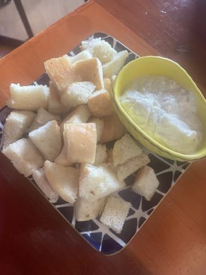 Artichoke dip with bread. Very goodd  at Despacito in Burlington