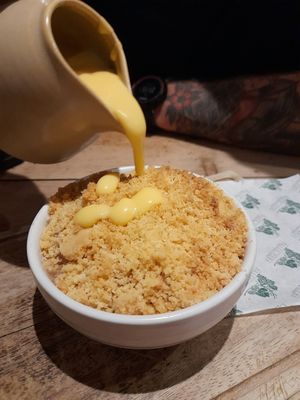 Soooo yummy: kentish apple crumble with vanilla custarf at The Pig & Sty in Ashford