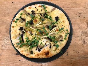 Wild mushroom, truffle & garlic flatbread at The Pig & Sty in Ashford