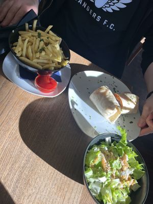 Seitan wrap and chips   at Cafe Erde in Graz