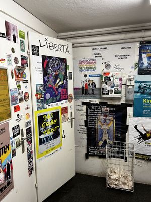 WC filled with fun stickers and messages    at Cafe Erde in Graz