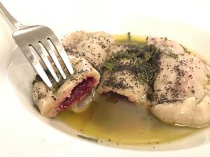 Beet filled dumpling in vegan butter sauce. at Cafe Erde in Graz