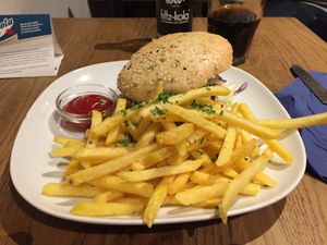 Vegan Burger with fries. at Cafe Erde in Graz