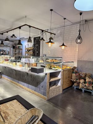 The counter with English and Spanish language menu  at Moringa in Barcelona