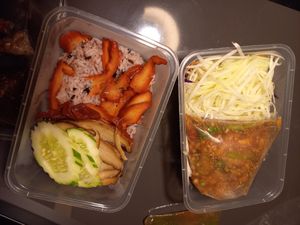 Delivery: vegan duck and pork on rice, papaya salad at Eat Me Veggie & Vegan in Bangkok