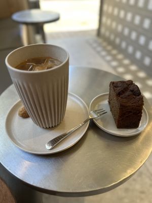 Oat milk iced latte and banana bread   at Clean in Hong Kong Island