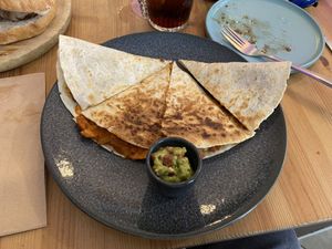 Quesadilla de seitán con guacamole  at La Oveja Negra in Madrid