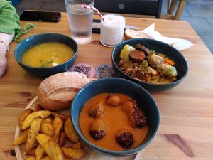 Albondigas with potatoes, soup and stew, cocos lemonade at La Oveja Negra in Madrid