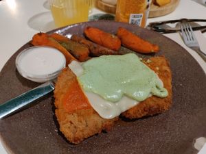Soy milanesa with sweet potato fries at La Oveja Negra in Madrid