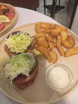 Milanesa con berenjena at La Oveja Negra in Madrid