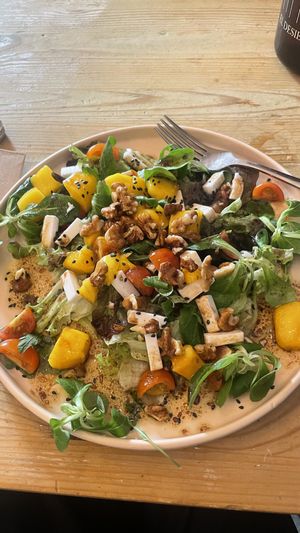 Lovely mango, vegan cheese, walnuts, really hit the spot!   at La Oveja Negra in Madrid