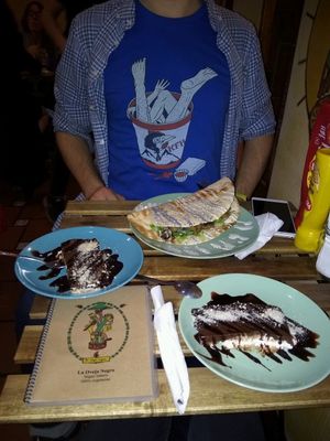 Cake and a main dish at La Oveja Negra in Madrid