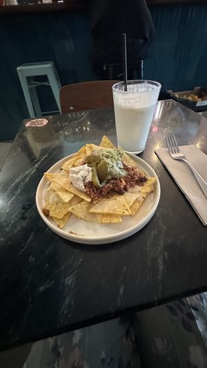 nachos and lemonade with coconut milk  at La Oveja Negra in Madrid