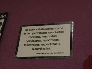 A sign above the door at La Oveja Negra in Madrid