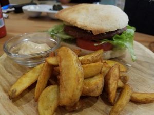Burger and fries at La Oveja Negra in Madrid