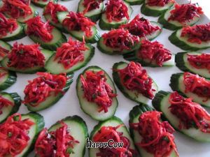 Beet and Carrot Salad on Sliced Cucumbers for catering
 at Magnolia Cafe in Guelph