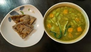 Naan and lentil green soup at Foody Vegan Experience Center  in Ulaanbaatar