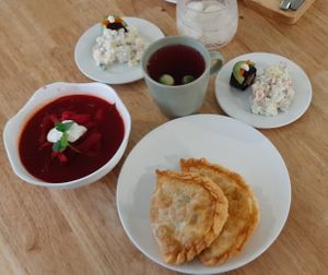 Lunch set: beetroot soup, potato salad, khuushuur, tea at Foody Vegan Experience Center  in Ulaanbaatar
