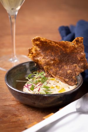 Espuma de couve flor trufada - opção vegan at Ordinário Restaurante in Sao Paulo