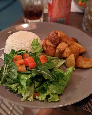 Rice, salad, potatoes that came with the parmigiana at Néctar Comida Afetiva in Itacare