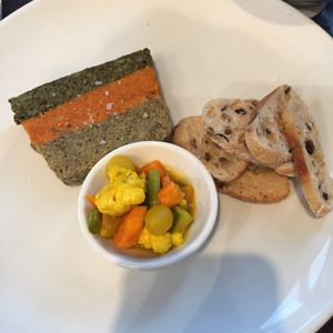 three lentil terrain with lovely miniature pickled vegetables and crisp bread at The Gate - Islington in London