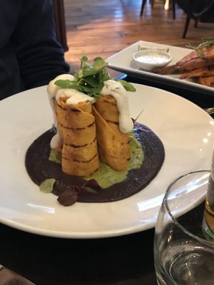 Tortillas with sweet potato, corn, coriander, spring onion and chilli served with black bean and chipotle purée, guacamole, sour cream at The Gate - Islington in London